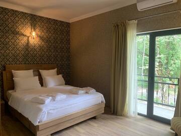 Фото номера Большой двухместный номер с 1 кроватью Отель Wald Hotel Lagodekhi Rooms г. Лагодехи 6