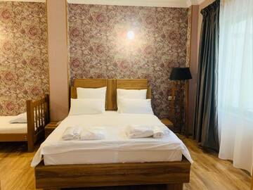 Фото номера Большой двухместный номер с 1 кроватью Отель Wald Hotel Lagodekhi Rooms г. Лагодехи 12