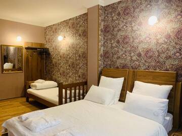 Фото номера Большой двухместный номер с 1 кроватью Отель Wald Hotel Lagodekhi Rooms г. Лагодехи 13