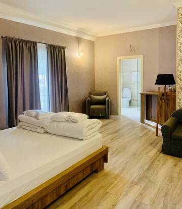 Фото номера Большой двухместный номер с 1 кроватью Отель Wald Hotel Lagodekhi Rooms г. Лагодехи 6