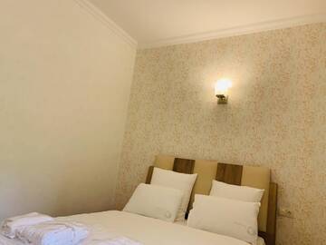 Фото номера Большой двухместный номер с 1 кроватью Отель Wald Hotel Lagodekhi Rooms г. Лагодехи 9